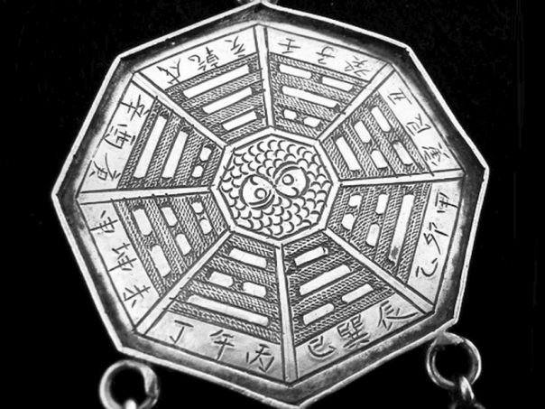 Octagonal amulet with Pa Kua and boy on qilin – (4139)